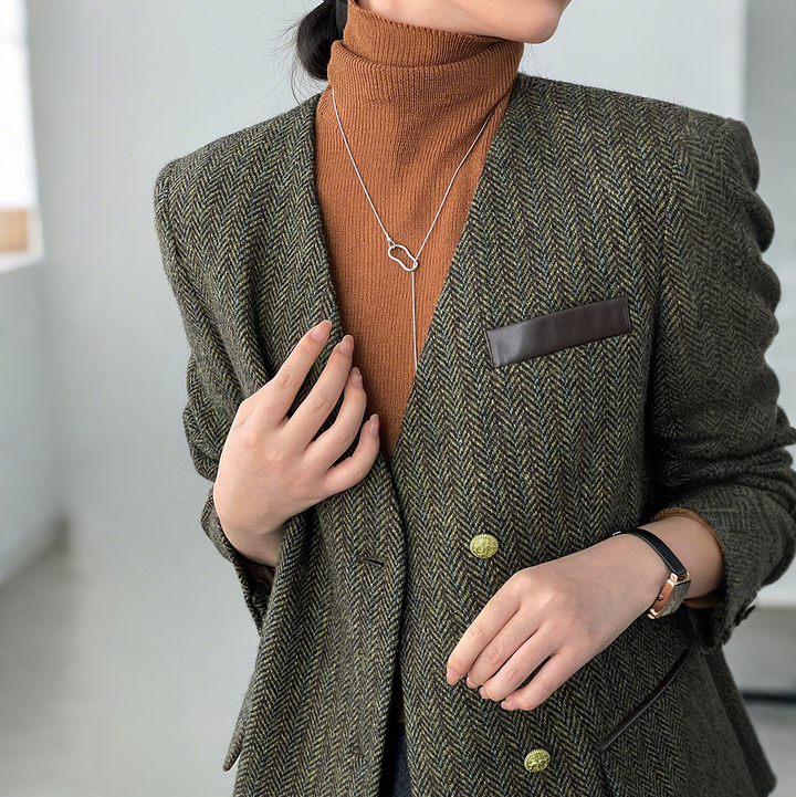 Damska marynarka wełniana w jodełkę z podwójnym zapięciem – elegancja w stylu vintage