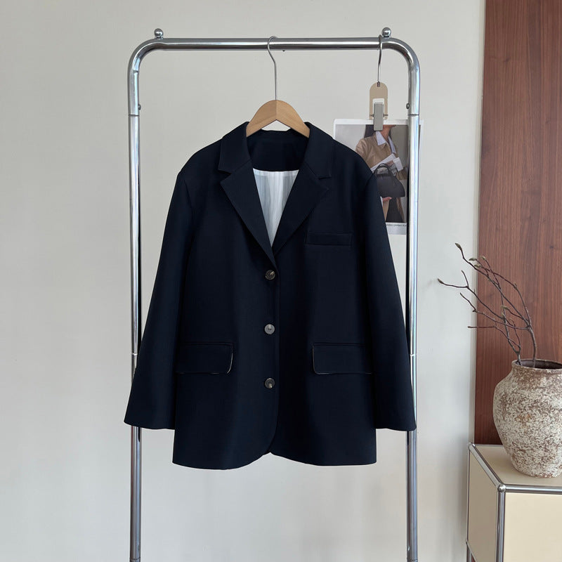 Damska marynarka oversize z kieszeniami z klapką – elegancki krój na każdą okazję