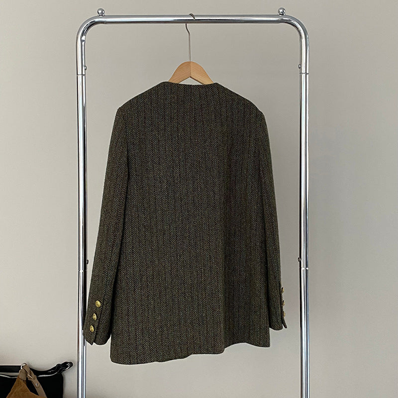 Damska marynarka wełniana w jodełkę z podwójnym zapięciem – elegancja w stylu vintage