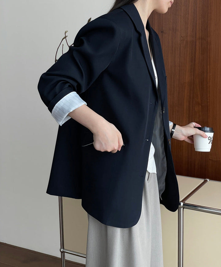 Damska marynarka oversize z kieszeniami z klapką – elegancki krój na każdą okazję